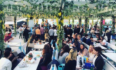 people sitting at the Pergola On The Roof rooftop